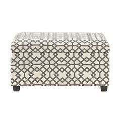 an upholstered storage box with black and white geometric designs