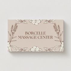 a business card with the words borccelle massage center in brown and white