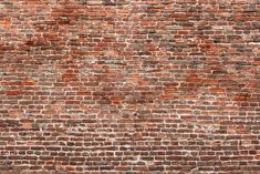 A close-up view of an old brick wall Red Brick Wallpaper, Brick Wall Wallpaper, Grey Brick, Timeless Aesthetic, Brick Wallpaper, Red Bricks, Wallpaper Mural, Exposed Brick, Rustic Elegance