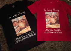 two t - shirts with family pictures on them are laying on the floor next to each other