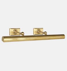 an image of two brass handles on a white background