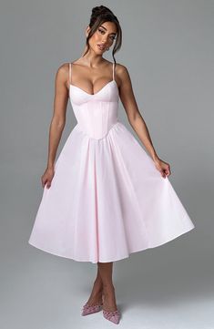 Make an entrance in Mariella, the party midi of your dreams this season. Super feminine and chic, this dress is truly an icon with a structured, corseted bodice that's boned to cinch your waist and contrasted by a full, voluminous skirt. 



Colour: Blush.

Non stretch cotton blend fabric.

Fully lined.

Corseted bodice that's boned to cinch your waist.

Super full, voluminous skirt.

Lace up back.

Adjustable straps.

Invisible zipper.

Midi length.

Model is an XS and is wearing an XS.

 Size: White Corset Midi Dress, Corset And Skirt Outfits, Librarian Clothes, Midi Bridal Dress, Plt Dresses, Homecoming Dresses Corset, Pink A Line Dress, Blush Pink Dress, Long Sleeve Bridesmaid Dress