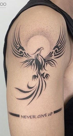 a woman with a tattoo on her arm has a bird and the words never give up