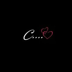 the word c is written in white and pink on a black background with two hearts