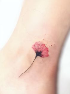 a small pink flower on the ankle