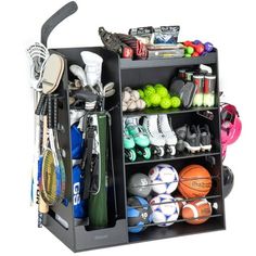 Declutter the garage and keep sports equipment and accessories looking neat! The GoSports Wooden Sports Equipment Organizer is a modern space-saving solution for neatly storing all the equipment that comes from having a sports family. The storage rack is great for golf, baseball, soccer, basketball, tennis, kids sports & toys and more! The premium build features a sturdy wood construction and is painted black for a clean look that complements your home. Don't settle for flimsy metal wire storage racks! Upgrade with multiple heavy-duty storage compartments: 1 main bin for large items, 3 shelves, ball bin, bat rack, and 8 hooks. The organizer includes illustrated step-by-step instructions for easy assembly; assembled size measures 44 L x 20 W x 47 H inches. The main bin measures 12 L x 20 W Home Sports Equipment Storage, Sport Equipment Storage Ideas, Organize Sports Equipment, Storage Sports Equipment, Golf Bag Storage Diy, Sports Ball Storage Garage, Sports Equipment Organization, Exercise Space, Organization Business