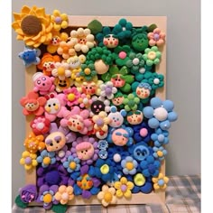 there are many different colored teddy bears on the wall