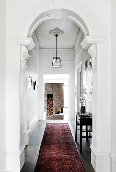 the hallway is clean and ready for us to use it as an entrance way in this house