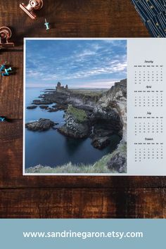 an image of a calendar on a wooden table