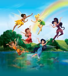 the tinkerbells are flying in the sky over the water with their rainbow