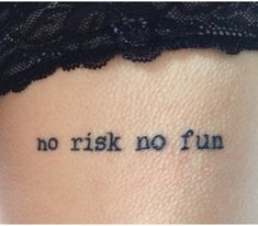 a woman with a tattoo saying no risk no fun on her thigh and the words written in cursive ink