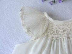 Smocked baby dress, smocked christening dress, ivory or white with Pointe d'Esprit angel sleeves Crochet Swaddle, Baby Flower Girl Dress, English Smocking, Smocked Baby Girl Dresses, Baby Blessing Dress, Fabric Angel, Smock Pattern, Creative Stitching, White Smocked Dress