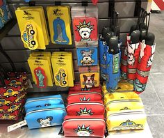 many different colored suitcases are on display