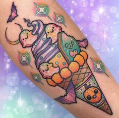 an ice cream cone tattoo on the leg