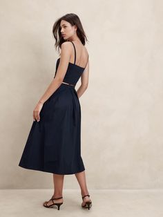 Poplin Pleated Midi Skirt | Banana Republic Factory Summer Evening Bottoms With Pleated Waist, Flattering Midi Skirt For Summer, Cocktail Flared Skirt With Pleated Waist, Summer Evening Skirt With Pleated Waist, Relaxed Fit Lined Skirt For Date Night, Gathered Midi Skirt For Evening, Relaxed Knee-length Skirt For Date Night, Relaxed Fit Midi Cocktail Skirt, Relaxed Midi-length Cocktail Skirt