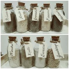 several jars with labels on them containing different types of spices and grains, each labeled with their own name