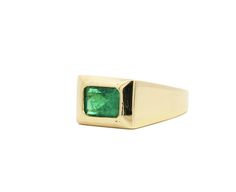 "Vintage 18K Yellow Gold Solitaire Men's Ring, weighing 15.4 grams, the ring showcases a ~3.0 carat Emerald-Cut Emerald (10.65 x 7.6 x 6.1mm) in a bezel setting. A simple and classy ring that is noticeably valuable.  The emerald features a darker green rich color hue, very good luster, and clarity Details:  Item Type: Mens Ring   Metal: 18k yellow gold   Size: US 10.25  Weight: 15.4 Grams Center Stone Details: Type: Natural Emerald Carat: 3.00 (approx.) Color: Green  Cut: Emerald  Measurements: East West Emerald Ring, Classy Ring, Gold Emerald Ring, Emerald Ring Gold, Yellow Gold Solitaire, Bezel Set Ring, Set Ring, Ring Pictures, Mens Ring