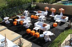 an aerial view of tables and chairs set up in the shape of rectangles