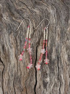 Simple, dainty beaded earrings in a beautiful star-shaped rose quartz and pink color scheme! The earring hooks are sterling silver, which makes them safe for most sensitive ears. These are lightweight and should be suitable for everyday wear.  Length is about 2.5 inches. Care Instructions: To keep your earrings looking their best, store them in a dry place away from moisture. Please remove all jewelry before swimming or showering. Please visit my shop for other great listings!  Message me with any questions and thank you for visiting my shop! Star Seed, D I Y Crafts, Pink Color Schemes, Boho Gifts, Earrings Minimalist, Seed Bead Earrings, Earring Hooks, Quartz Rose, Earrings Boho