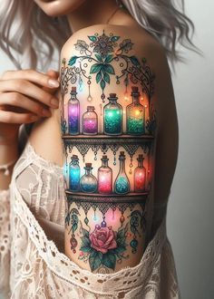 a woman with a tattoo on her arm and chest is holding a glass bottle filled with colorful