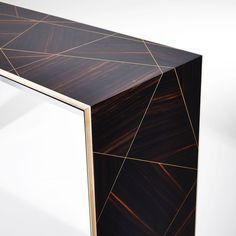 a black and white table with gold lines on it