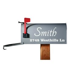 a mailbox with the name smith on it and a red handle attached to it