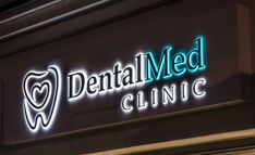 dental med clinic sign lit up at night