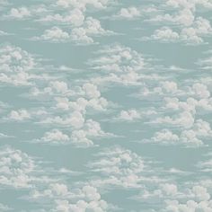 the sky is filled with white clouds on a pale blue wallpaper background that looks like it has been painted in pastel shades