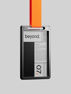 an orange and black id badge with the word beyond on it's front side