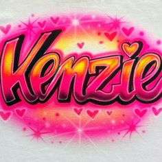 the word kenzie is painted in bright pink and yellow colors with hearts on it