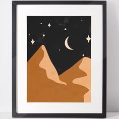 a black frame with a desert landscape and stars in the night sky above it is an orange mountain