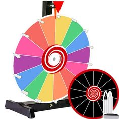 a spinning wheel with three different colors on the front and back sides, along with two markers