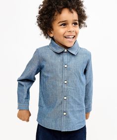 Breathable, durable twill for year-round comfort Signature Oso stacked buttons Pointed collar for classic look Made from the softest-ever cotton, this dress shirt is an evolution of our Jefferson shirt with a new, classic pointed collar. It features a play-ready fit with extra shoulder room so that active kiddos can freely move around. The flat shirt tail looks great untucked for a relaxed look or tucked in for a polished vibe. Fitted Cotton Dress Shirt For Everyday, Solid Shirt With Button Cuffs For Everyday Wear, Classic Everyday Shirt With Buttons, Everyday Long Sleeve Dress Shirt With Button Closure, Classic Shirt With Snap Buttons For Everyday, Classic Cotton Button-up Tops, Classic Shirt With Spread Collar For Everyday, Classic Everyday Shirt With Spread Collar, Fitted Long Sleeve Shirt For Everyday