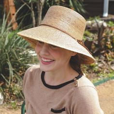 These hats are the best for sun protection– UPF 50+ - by the California Polytechnic Textile Research and Testing Laboratory, meaning sunlight won’t filter through, keeping your skin safe and healthy.* Handmade in Mexico Materials: 100% natural palm fiber One size (hat size 7, 22 inches) Approximately 3.5 in. brim. View Sizing Chart Stretch sweatband Leather chinstrap with wooden be Lightweight Solid Sun Hat With Uv Protection, Lightweight Wide Brim Hat For The Beach, Lightweight Wide Brim Hat For Beach, Coastal Sun Hat With Upf 50+ For Sunbathing, Lightweight Curved Brim Hat For Sunbathing, Lightweight Hats With Curved Brim For Sunbathing, Lightweight Hats With Uv Protection For Beach Season, Upf 50+ Panama Hat For Vacation Sunbathing, Adjustable Lightweight Panama Hat For Sunbathing