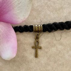 This is a antique bronze dread/braid cuff (or Euro style bracelet charm) featuring an antique bronze ankh charm.  Two cuff/bail styles available. See pic 3 Size: Opening/hole is 5mm for both cuff styles.  These are solid cuffs, they are not adjustable and they do not open. 💥See all pics for a size comparison to a US dime.  Please use the dropdown menu for your cuff style choice.  All items are lead and nickel free. Adjustable Bohemian Bracelet With Antique Finish, Dread Braids, Braid Cuffs, Dreadlock Jewelry, Loc Jewelry, Dreadlock Hairstyles, Jewelry Antique, Euro Style, Size Comparison