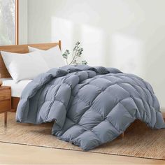 Experience unmatched comfort and style with our varied color option comforter in a sleek and elegant steel gray shade. Duvet Ties, White Down Comforter, Feather Comforter, Top Of Bed, Down Comforters, Goose Feather, White Goose, Goose Feathers, Lightweight Blanket