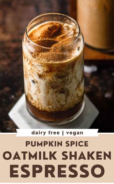 pumpkin spice oatmik shaker espresso in a glass jar with cinnamon sprinkles