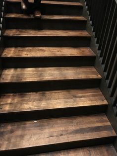 a man sitting on top of a set of stairs