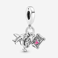 It’s time to pack your bags and add the Airplane, Globe & Suitcase Dangle Charm to your collection. 3 charms in 1, this sterling silver piece is every travel lover’s dream. Details include grooved windows on the airplane, longitude and latitude lines on the globe and a hand-applied pink enamel heart on the suitcase. Add this travel charm to your collection as a promise to plan future adventures or gift it to your globe-trotting BFF. Pandora Airplane Bracelet | Globe & Suitcase Dangle Charm | Ste Travel Sterling Silver Jewelry, Charms Pandora, Travel Charms, Bracelet Pandora, Pandora Bracelet Charms, Bracelet Diy, Pink Enamel, Pandora Bracelets, Dangle Charms