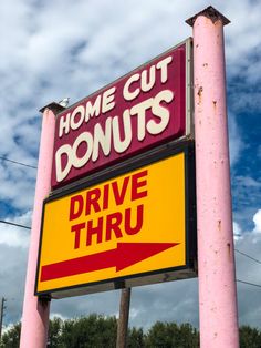 a sign that says home cut donuts drive thru