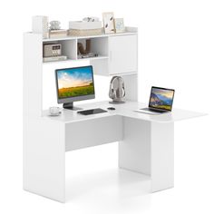 a white desk with two computers on it