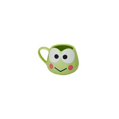 a green mug with eyes and nose on it's side, sitting against a white background