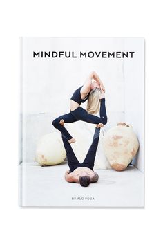 the book is titled mindful movement, with an image of a woman doing yoga