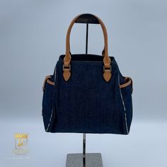 Burberry Denim Handbag In Very Good Condition Noticeable Flaws: Minor Stitch Frayed In The Handle And Water Marks. Exterior: Denim Fabric Interior: Fabric Nylon Hardware: Silver Approx.: 9 X 9 X 5 "Please Refer To Photos For Additional Details" Available In Store And Website Purchase For $ 240 Uispsolpi82408 Luxury Denim Bags With Double Handle, Luxury Denim Bag With Double Handles, Luxury Denim Shoulder Bag With Double Handle, Luxury Denim Tote Bag, Luxury Denim Blue Denim Bag, Luxury Denim Double Handle Shoulder Bag, Luxury Denim Tote Shoulder Bag, Daily Use Top Handle Denim Shoulder Bag, Denim Shoulder Bag With Top Carry Handle For Shopping