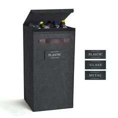 a black trash can with three bottles in it and two labels on the side that say plastic, glass, metal