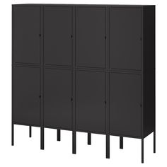 a black cabinet with four doors on each side and three legs at the bottom, in front of a white background