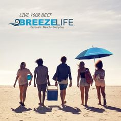 four people walking in the sand with an umbrella and cooler on their back, while the words breeze life live your best are above them