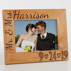 a personalized wooden frame for a couple