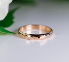 "This stackable 14k yellow gold hammered ring is perfect for wearing alone or mixing and matching with your other rings. It's perfect for as wedding band or promise ring. This band was hand crafted in Melt'm Jewelry Studio in California. DETAILS AND MATERIAL Band is 3 mm wide and 1.5 mm thickness and hammered. Please contact me for non hammered, satin or mirror finish. 14k solid yellow gold. RING SIZE : Please choose your size from drop down menu. Thank you! HANDMADE TO ORDER within 1 week after Classic Hammered Wedding Rings, Gold Hammered Wedding Bands, 14k Gold Hammered Stackable Wedding Rings, Hammered Gold Rings For Wedding, 14k Gold Hammered Wedding Rings, Hammered Gold Wedding Band, Hammered Wedding Band, Thick Gold Band, Hammered Wedding Bands