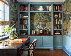 a room with bookshelves filled with lots of different types of books and decorations